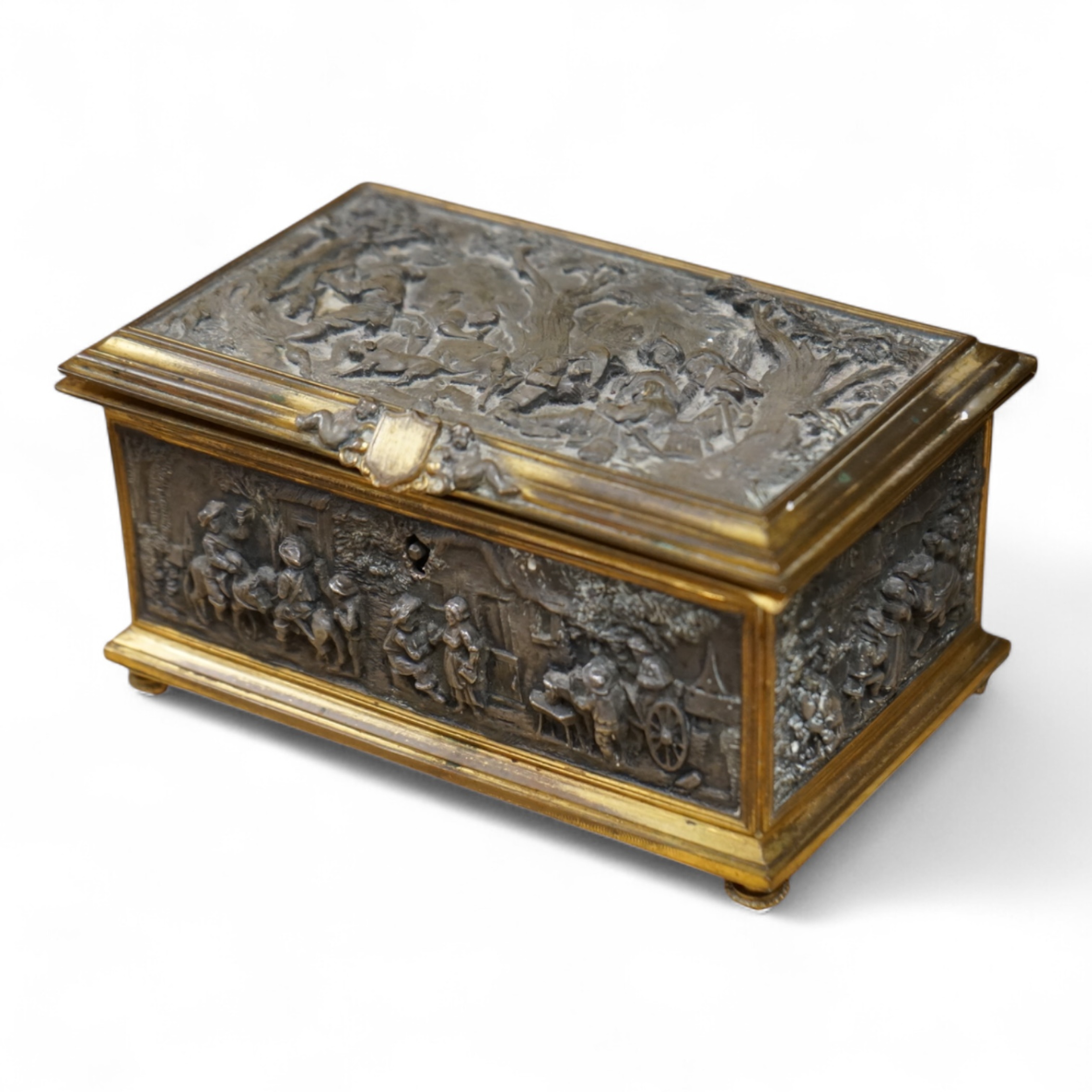A late 19th century French gilt copper jewellery casket with electrotype relief panels, stamped A B Paris to the base, with key, 14cm wide